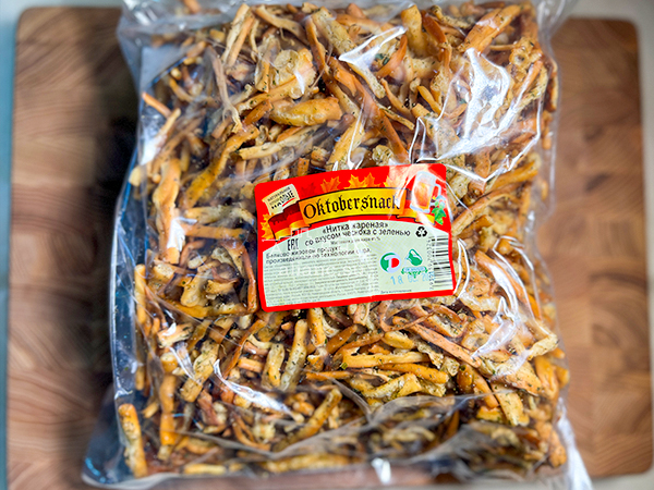 Нитка ЖАРЕНАЯ "Чеснок с зеленью" Oktobersnack 1 кг (сырный продукт) в Реутове